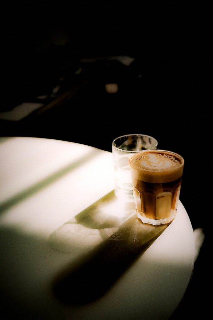 Two glasses of coffee on a table